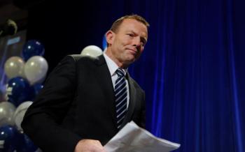 Australian coalition party leader Tony Abbott arrives to make a speech at an election night function in Sydney on August 21. (Greg Wood/AFP/Getty Images)