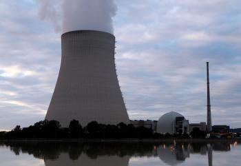 A cooling tower at the Isar 1 and 2 nuclear power plant is pictured at dusk on near Landshut, Germany. Constellation Energy Group Inc. has scrapped a plan to borrow $7.5 billion with guarantees to build a nuclear reactor.   (Miguel Villagran/Getty Images )