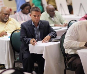 A man fills out a job application for grocery retailer ALDI as the company looks to fill job openings in one of the new stores opening in the South Florida area on Sept. 7, in Fort Lauderdale, Fla. (Joe Raedle/Getty Images) A man fills out a job application for grocery retailer ALDI as the company looks to fill job openings in one of the new stores opening in the South Florida area on Sept. 7, in Fort Lauderdale, Fla. (Joe Raedle/Getty Images)