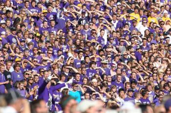 Fans of the Washington Huskies watch their team take the field prior to the game against the Syracuse Orange on Sept. 11, 2010 at Husky Stadium in Seattle, Washington. (Otto Greule Jr/Getty Images)