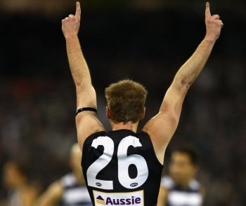 Ben Johnson of the Magpies celebrates kicking a goal during the First AFL Preliminary Final between the Collingwood Magpies and the Geelong Cats at Melbourne Cricket Ground on September 17 in Melbourne. (Mark Dadswell/Getty Images)