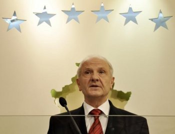 Kosovo President Fatmir Sejdiu announces his resignation during a press conference in Pristina on September 27. (Armend Nimani/Getty Images )
