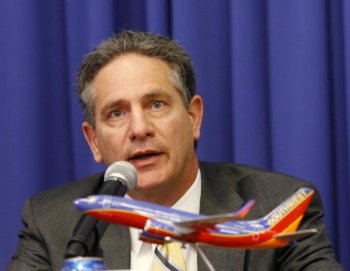 AirTran Chairman, President & CEO Robert L. Fornaro gives a press conference about Southwest Airlines' plan to merger with AirTran Airways at Southwest Airlines Corporate Headquarters September 27, in Dallas, Texas.   (Lawrence Jenkins/Getty Images )
