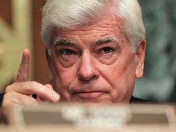 FOCUSING ON THE BIG PAYCHECK: Committee Chairman Sen. Christopher Dodd (D-Conn.) speaks during a hearing before the Senate Banking, Housing, and Urban Affairs Committee Sept. 30, 2010, on Capitol Hill. The hearing was to focus on the Dodd-Frank Wall Street Reform and Consumer Protection Act. (Alex Wong/ Getty Images)