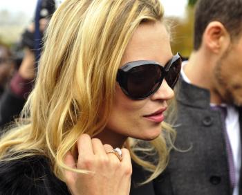 British model Kate Moss arrives for the Christian Dior Spring/Summer 2011 ready-to-wear collection show on Oct. 1 in Paris. (Etienne Laurent/AFP/Getty Images)