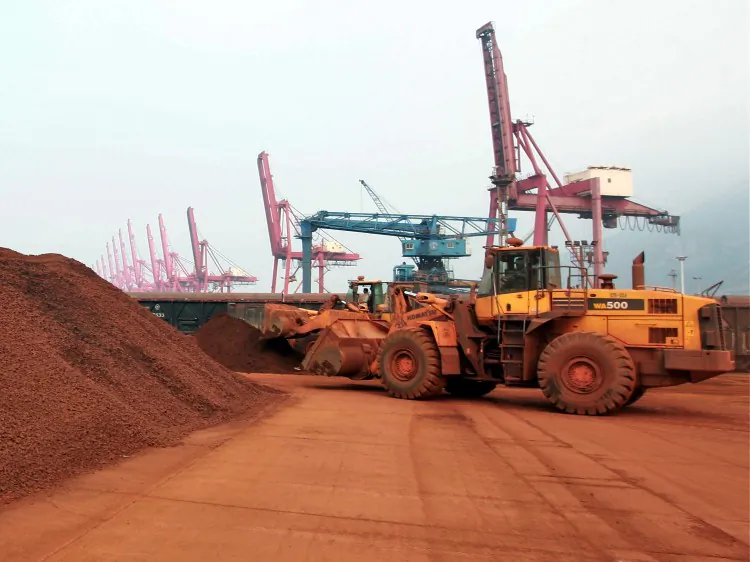 A front loader shifts soil containing rare earth minerals at a Chinese port for export to Japan in 2010. China has previously punished Japan with rare earth export embargoes, but that strategy may not be as viable now. (STR/AFP/Getty Images)