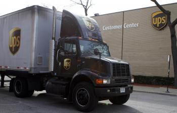 A United Parcel Service (UPS) truck leaves the yard October 29, in Chicago, Illinois. (Frank Polich/Getty Images )