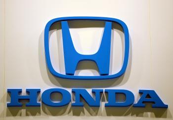 The Honda logo. Honda is recalling 35,000 Passport SUVs due to suspension brackets that risk failure after salt corrosion.