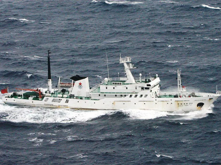 A Chinese fisheries patrol ship in 2010, near the Senkaku Islands. Recently Chinese warships approached Japanese waters before turning away, sparking concerns about Chinese military intentions in the context of territorial disputes with Japan in the East China Sea. (Jiji Press/AFP/Getty Images)