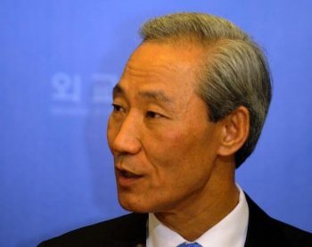 NEW DEAL: South Korean Trade Minister Kim Jong-Hoon speaks during a news conference about the South Korea-U.S. free trade agreement at the foreign ministry in Seoul on Dec. 5. (Park Ji-Hwan/Getty Images)