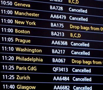 UK SNOW CHAOS: Departure information screens show cancellations at Heathrow Airport on Dec. 20 in London. Severe weather has caused major disruption at the UK's biggest airport for a third day. (Peter Macdiarmid/Getty Images)
