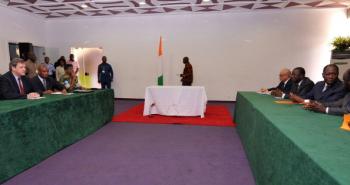 UN peacekeeping chief Alain Le Roy (1stL) and Ivory Coast's internationally recognized leader Alassane Ouattara (2R)attend a meeting along with other officials on Dec. 27, in Abidjan. (STR/AFP/Getty Images)