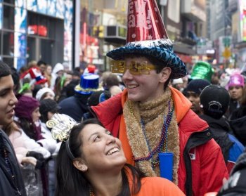 New Year's Eve in Times Square: Revelers who want a good view of the ball dropping arrive early in the afternoon and wait until midnight. (Brian Harkin/Getty Images)