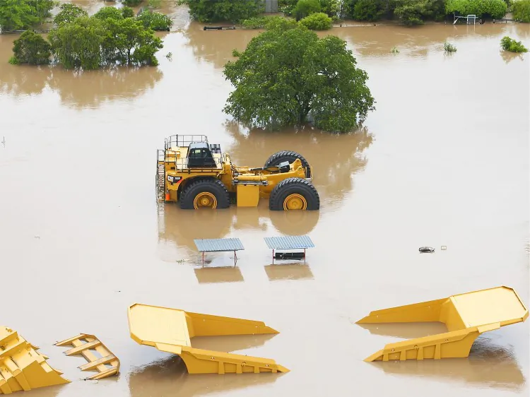 Mining equipment is submerged by flood waters on Jan. 6, 2011 in Rockhampton, Australia. (Jonathan Wood/Getty Images)