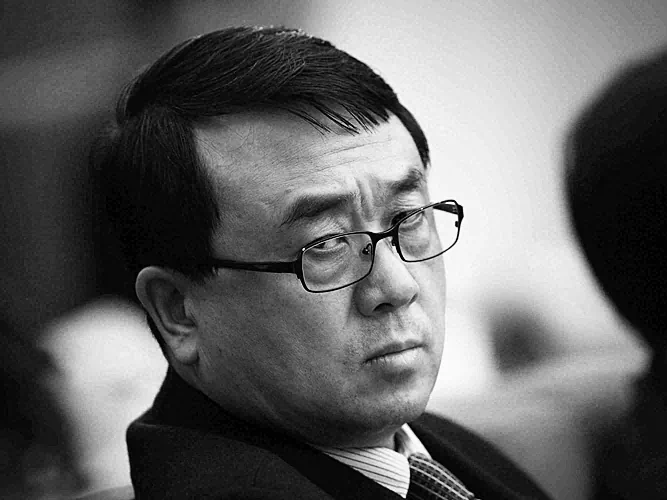Wang Lijun, former Chief of Chongqing Public Security Bureau, attends a meeting during the annual National People's Congress at the Great Hall of the People on March 6, 2011 in Beijing, China (Photo by Feng Li/Getty Images)
