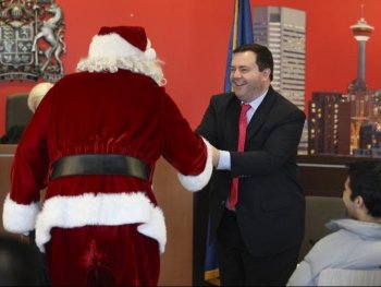 Citizenship and Immigration Minister Jason Kenney pulled Santa into the sovereignty issue during a special citizenship ceremony in Calgary on Wednesday. (Courtesy of Citizenship and Immigration Canada)