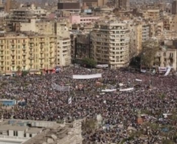 On Feb. 4, 2011, Tahrir Square packed for renewed protests calling for Mubarak to leave office immediately.(Photo by Peter Macdiarmid/Getty Images)