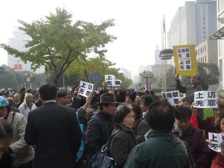 On the morning of Nov. 23 over 1,000 veterans of Cultural Revolution protested outside People’s Square in Shanghai. (Courtesy of protesters)