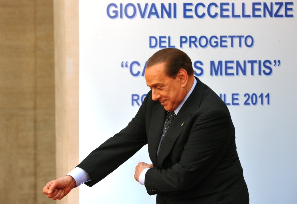 Italian Prime Minister Silvio Berlusconi dances during an award ceremony for youth called 'Campus Mentis' on April 8, 2011 in Rome. (Alberto Pizzoli/AFP/Getty Images) 