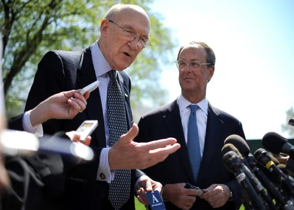 Democrat Erskine Bowles (R) and Republican Alan Simpson speak to reporters after a 2011 meeting with U.S. President Barack Obama at the White House in Washington, D.C. The chairmen of the National Commission on Fiscal Responsibility and Reform presented their proposal to reach $2.4 trillion in savings over 10 years on Feb. 19, 2013, in Washington. (Jewel Samad/AFP/Getty Images)