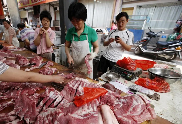 A butcher stall at a market in Huaibei, east China's Anhui province on June 20. Illegal use of 'lean meat powder,' a banned drug in animal feed, has become widespread in China. Lean meat powder inhibits the growth of fat in farm animals, thus making the meat taste better, but poisonous to humans. (STR/AFP/Getty Images)