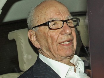 Rupert Murdoch, the chief executive officer of News Corp., is driven from his apartment on July 12, in London, England, after the media found out about News Corp.'s alleged phone hacking scandal.  (Oli Scarff/Getty Images )