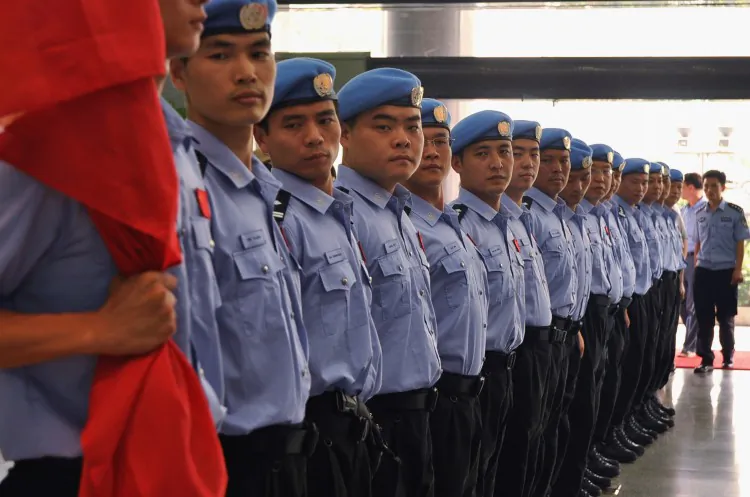 Policemen attend a departure ceremony at Hunan Public Security Bureau in 2011. (ChinaFotoPress/Getty Images)