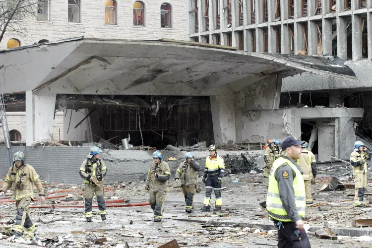 Firefigthers work at the site of an explosion near government buildings in Norway's capital Oslo, on July 22, 2011. (Roald Berit/AFP/Getty Images)