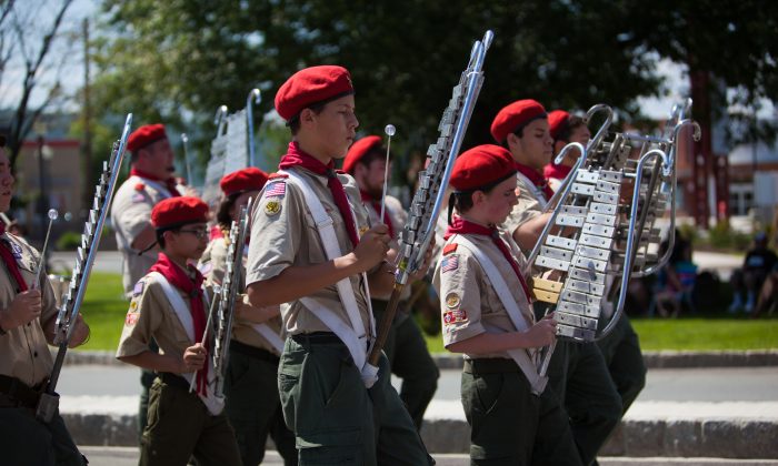Percussionists from Boy Scouts of America Troop 236 of Maybrook, N.Y., in the 165th annual fireman's Inspection Day Parade in Port Jervis, N.Y., on July 11, 2015. (Jeff Nenarella/The Epoch Times)