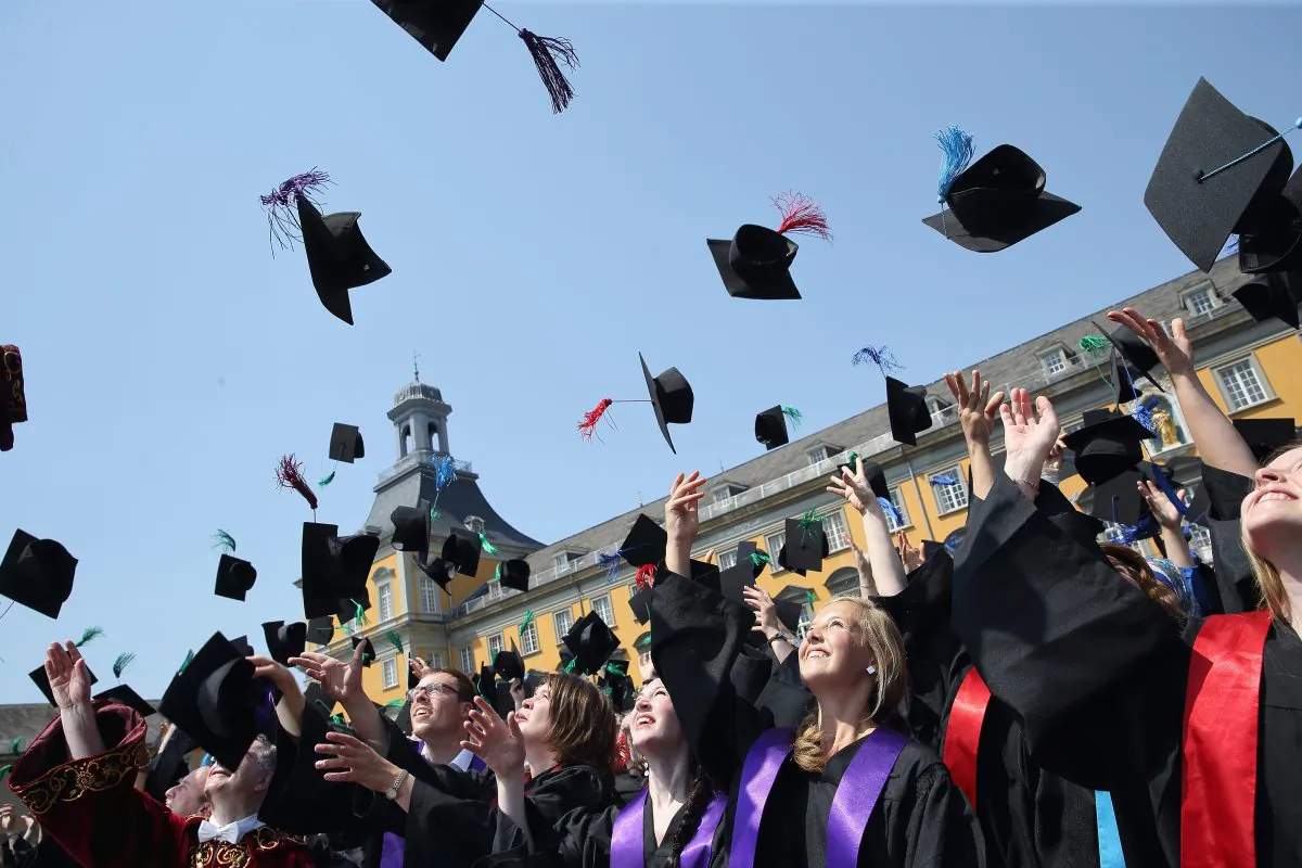 Three million Australians will see their university student debt reduced by a collective $3 billion. (Andreas Rentz/Getty Images)