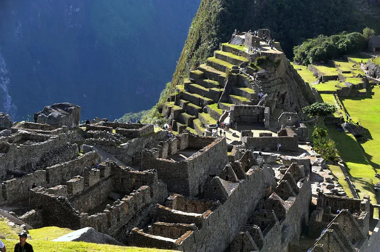 Tourists walk among the ruins of the Machu Picchu citadel, 130 km northwest of Cusco, Peru on July 6, 2011. (Chris Bouroncle/AFP/Getty Images)