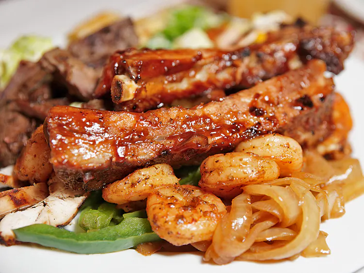 Spicy southwest spareribs with sauteed shrimp on the side.