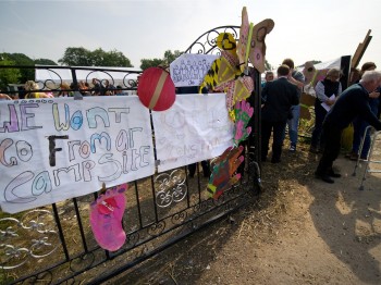 Residents of the Dale Farm Travelers' site near Basildon in Essex, England leave the communal area, after addressing the media at a press conference, on Sept. 2, 2011. (Leon Neal/AFP/Getty Images)