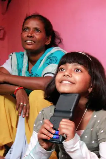 Actor Rubiana Ali plays alongside her mother at her home on March 3, in Mumbai, India. Rubiana starred in the Academy Award-winning film 'Slumdog Millionaire'. (Ritam Banerjee/Getty Images)