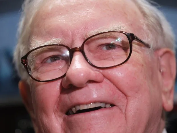 Billionaire investor Warren Buffett is seen on the floor of the New York Stock Exchang last September. Buffett briefed investors on Berkshire Hathaway’s fourth-quarter earnings, and said that he has identified a successor as the company’s future CEO. (Mario Tama/Getty Images)