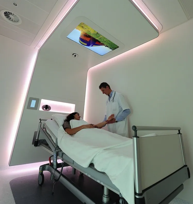 A doctor stands next to a sick woman at the Dutch Royal Philips Electronics Hospital research facility in the Netherlands, October 2011. During the second quarter of 2012, Warren Buffett’s Berkshire Hathaway has reported investing $1 billion in Dutch industrial Philips. (Lex Van Lieshout/AFP/Getty Images)