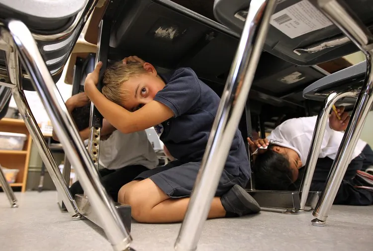 Third-grade students at William L. Cobb Elementary School participate in the Great California ShakeOut earthquake drill on Oct. 20, 2011, in San Francisco, Calif. (Justin Sullivan/Getty Images)