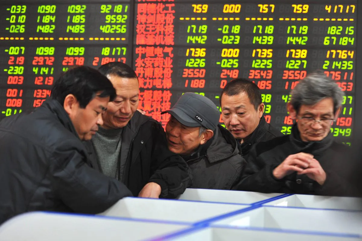 Chinese stock investors at a securities firm in Fuyang, in China's Anhui province, on Jan. 7, 2015 (STR/AFP/Getty Images)