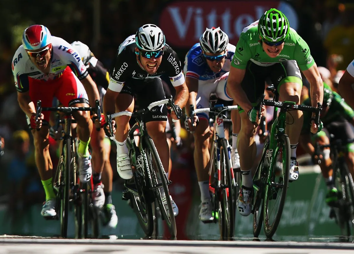 Mark Cavendish (C) of Great Britain and Etixx-Quick Step and Andre Greipel (R) of Germany and Lotto-Soudal sprint for the finish line during stage seven of the 2015 Tour de France, a 190.5km stage between Livarot and Fougeres on July 10, 2015 in Fougeres, France. (Bryn Lennon/Getty Images)
