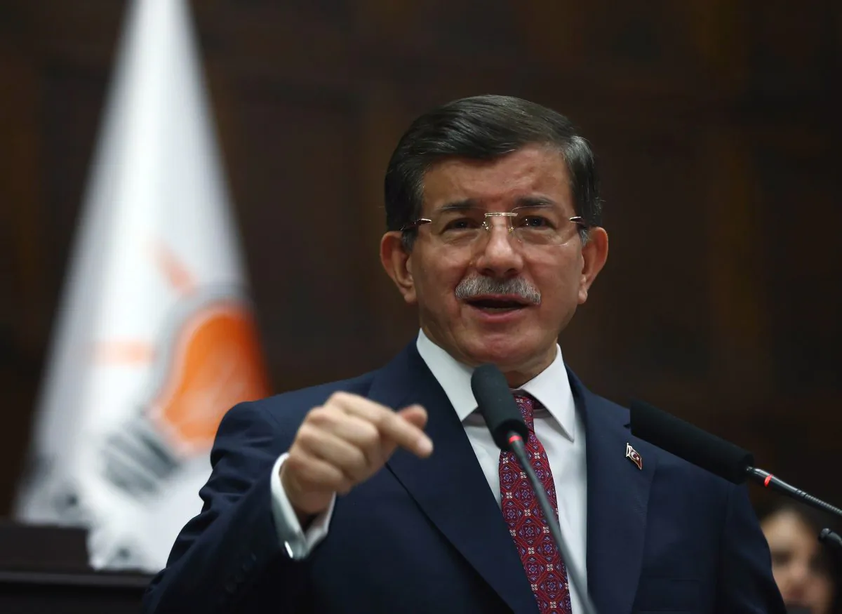 Turkish Prime Minister Ahmet Davutoglu addresses his ruling party lawmakers in Ankara, Turkey, Thursday, July 9, 2015. (AP Photo)