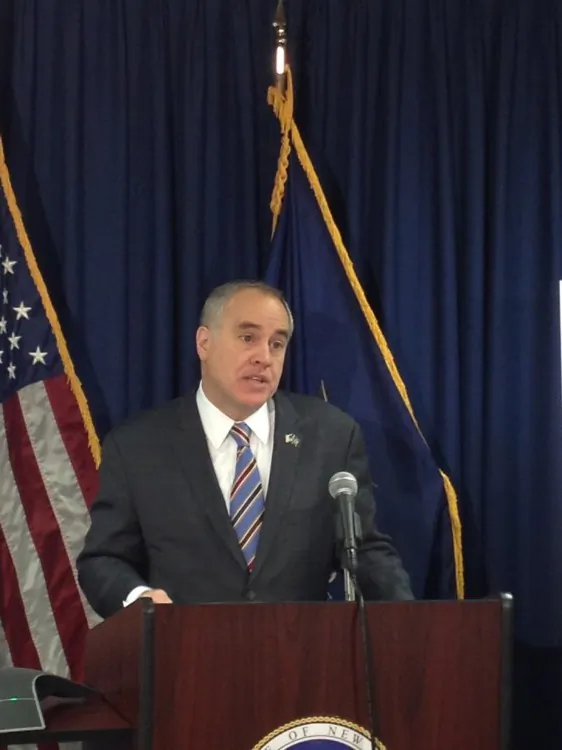 New York State Comptroller Thomas DiNapoli speaks at a press conference on Feb. 26. He announced that Wall Street bonuses rose by 8 percent to $20 billion in 2012. (The Epoch Times)
