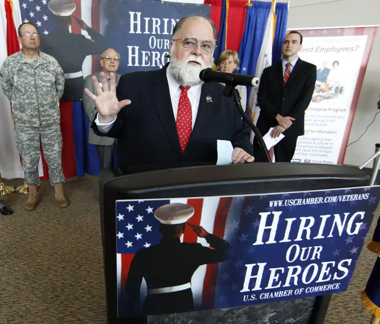 Terry Schow, Utah Executive Director of the Utah Department of Veterans Affairs, opens up the 'Hiring Our Heroes' job fair November 4, 2011 at the South Towne Expo Center in Sandy, Utah. (George Frey/Getty Images)
