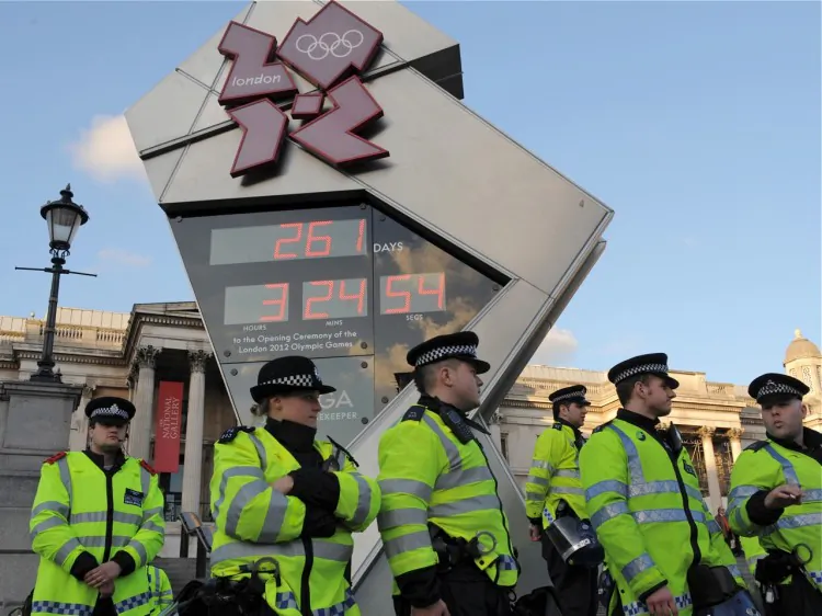Police secure the Olympic countdown clock in Trafalgar Square in London on Nov. 9, 2011. (Daniel Sorabji/AFP/Getty Images)