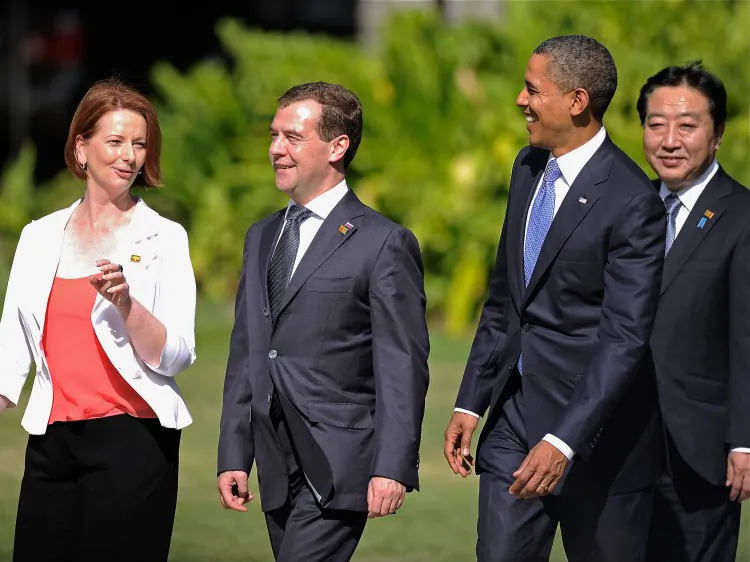 Australian Prime Minister Julia Gillard (L) Russian President Dmitry Medvedev (2nd-L) U.S. President Barack Obama (C) and Prime Minister of Japan Yoshihiko Noda, walk out to take photos at the Asia-Pacific Economic Cooperation (APEC) Summit Nov. 13 in Honolulu, Hawaii. Nine APEC nations have welcomed a new trans-Pacific free trade agreement. (Kevork Djansezian/Getty Images)