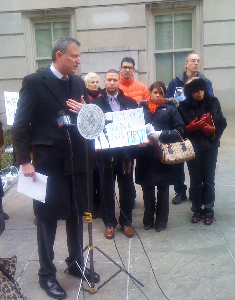 Public Advocate Bill de Blasio joined parents in front of the Tweed Courthouse on Sunday. (Courtesy of Wiley Norvell)