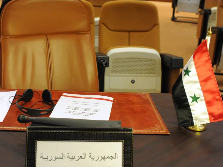 The empty seat of Syrian delegation is seen during a meeting comprising of Arab league Member states and Turkey to discuss a response to the crackdown in Syria, in Rabat on Nov. 16, 2011. (Abdelhak Senna/AFP/Getty Images)