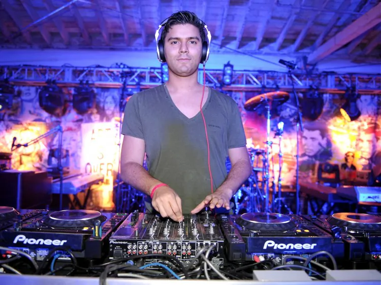 Rising Dutch DJ and producer R3hab performs during the launch of Google Music hosted by T-Mobile at Mr. Brainwash Studio in Los Angeles, Calif., Nov. 16. (John Shearer/Getty Images for T-Mobile)