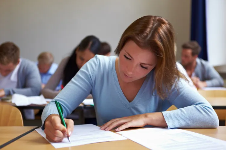 A-levels may get tougher in England to stretch brighter pupils. (Robert Kneschke/Photos.com)