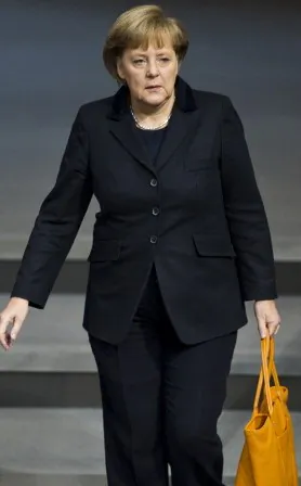 German Chancellor Angela Merkel arrives for a session of Germany's Bundestag lower house of parliament, in Berlin November 23. (JOHN MACDOUGALL/AFP/Getty Images)