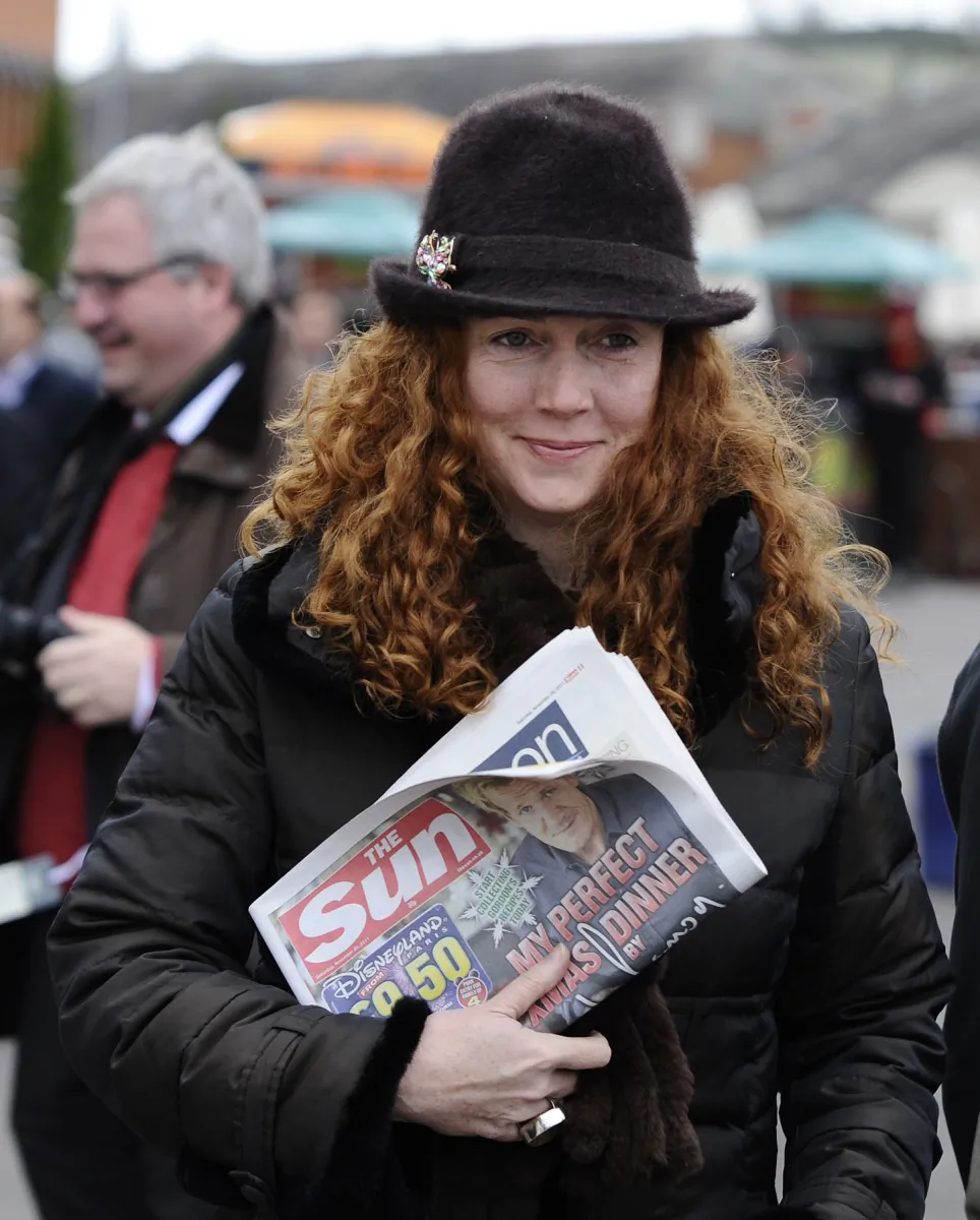 Rebekah Brooks, former chief executive of News International, arrives at Newbury racecourse in Newbury last year. The 43-year-old has been arrested as part of a police probe into the hacking of phone messages. (Alan Crowhurst/Getty Images)